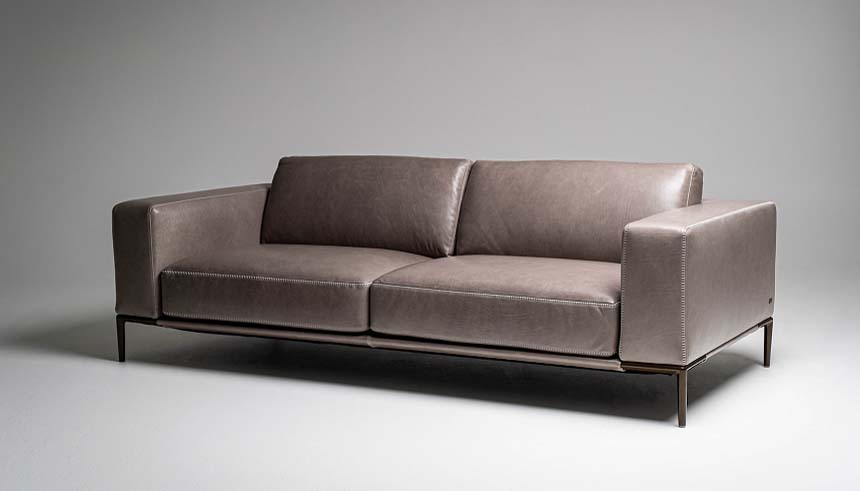 The Copenhagen sofa in smoky Mont Blanc leather from American Leather’s Metropolis collection has clean, contemporary lines, but deeper seating for extra comfort.