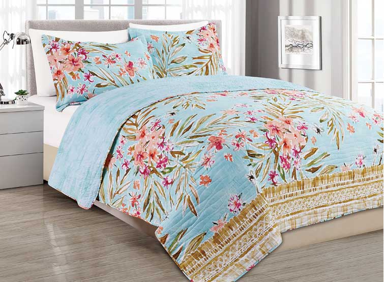 The digitally printed Nuevo Vallarta quilt set by Barbarian from Melange Home offers watercolor clusters of big, bold pink florals on a soft turquoise ground. Made of soft microfiber. 