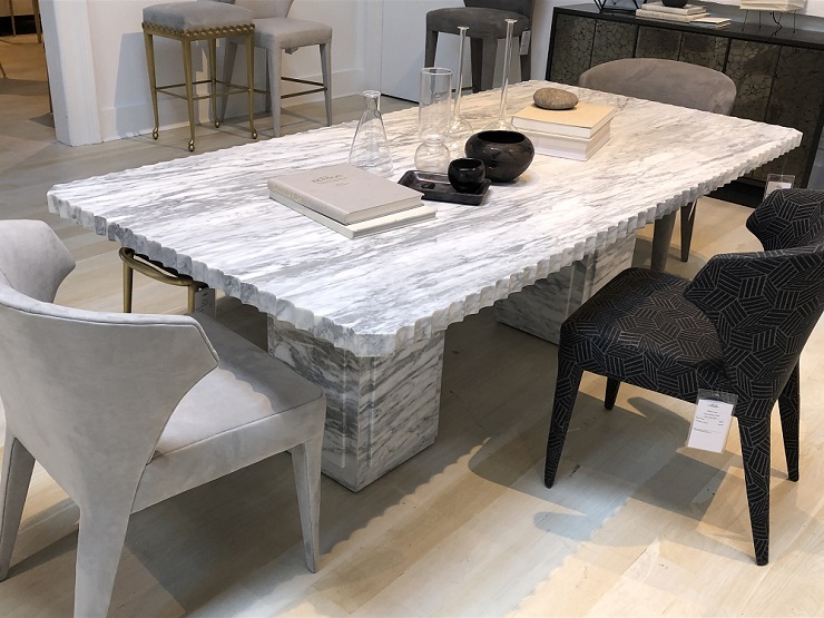This dining table is part of Baker’s Modern Luxe collection and is made with solid arabescato marble.