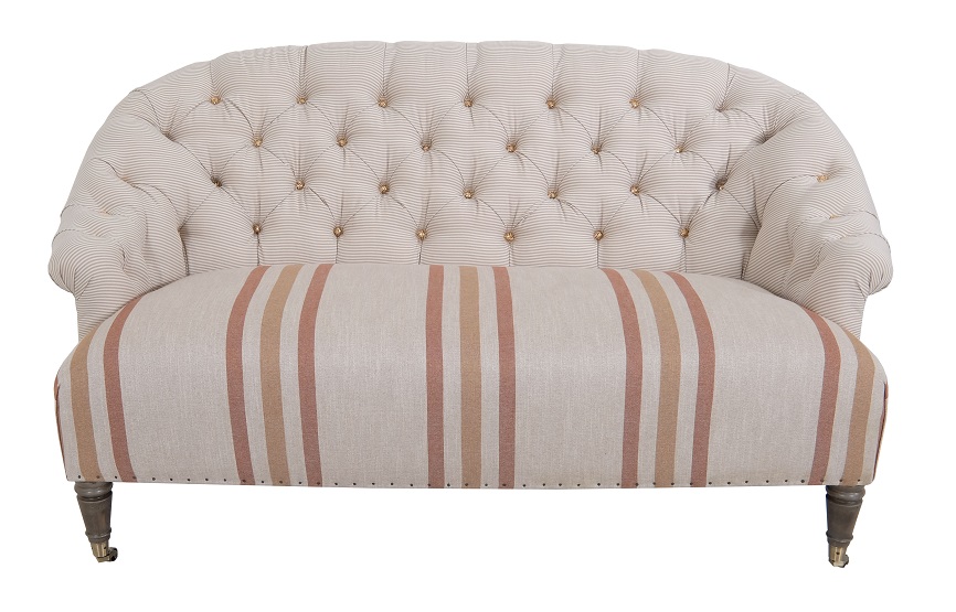 Norwalk Furniture’s Boston settee shows off a milder mix of light and dark in this fabric. At 50 inches, the piece works well paired or alone for bedrooms and smaller spaces.